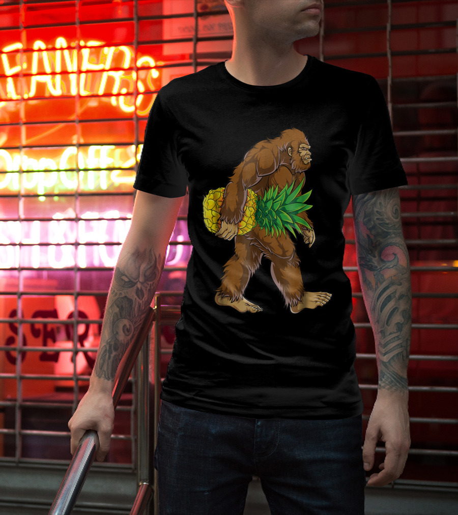 Bigfoot Carrying Pineapple Funny Sasquatch Iconic Creature Humor T-Shirt