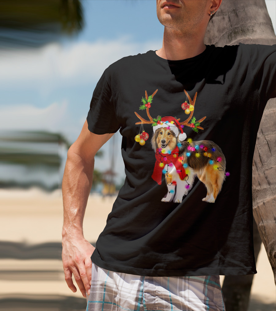 Christmas Sheltie Dog In Santa Hat With Reindeer Antlers And Colorful String Lights T-Shirt