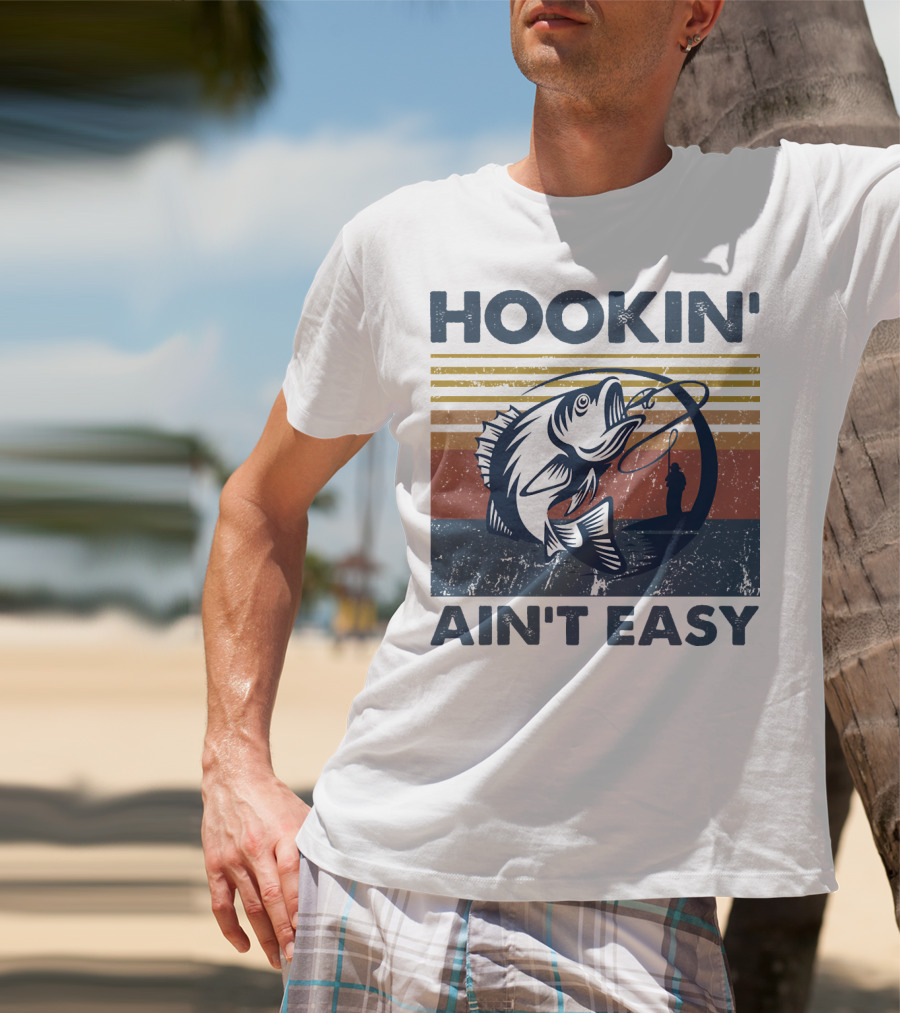 Hookin' Ain't Easy Vintage Fishing Graphic With Striped Sunset And Angler T-Shirt