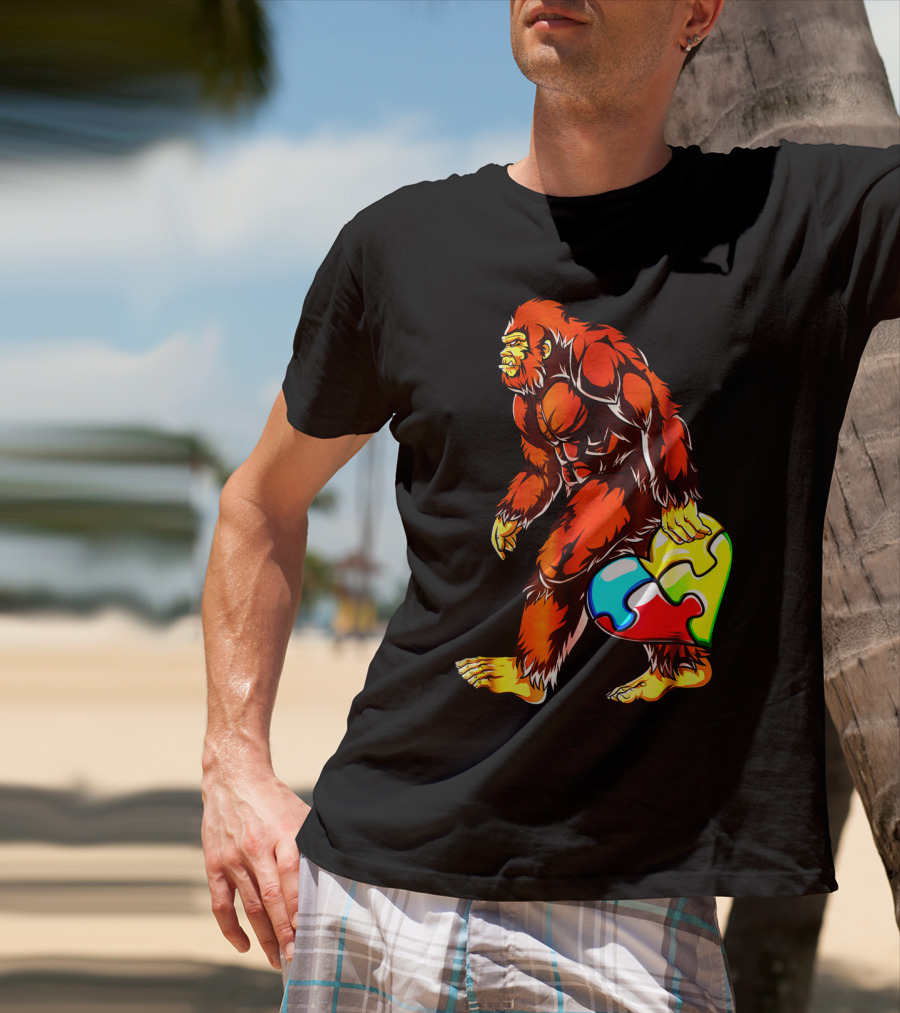 Bigfoot Holding Heart-Shaped Puzzle Piece For Autism Awareness T-Shirt