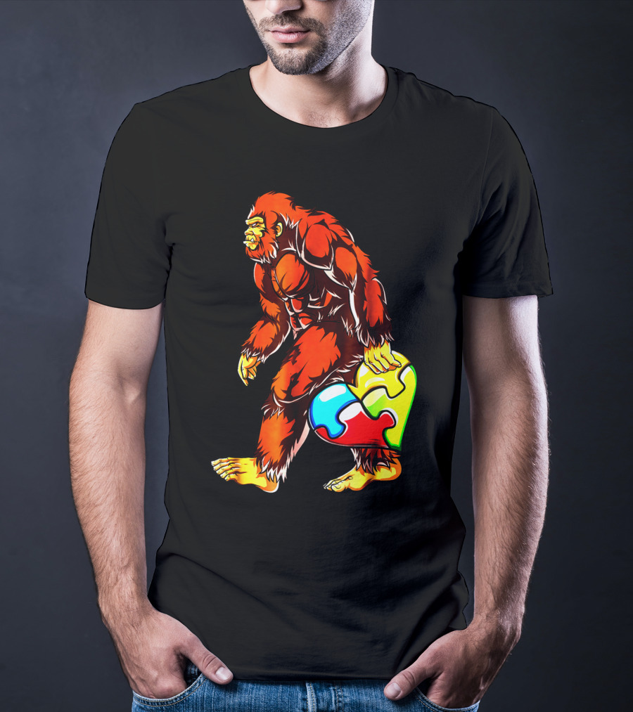 Bigfoot Holding Heart-Shaped Puzzle Piece For Autism Awareness T-Shirt