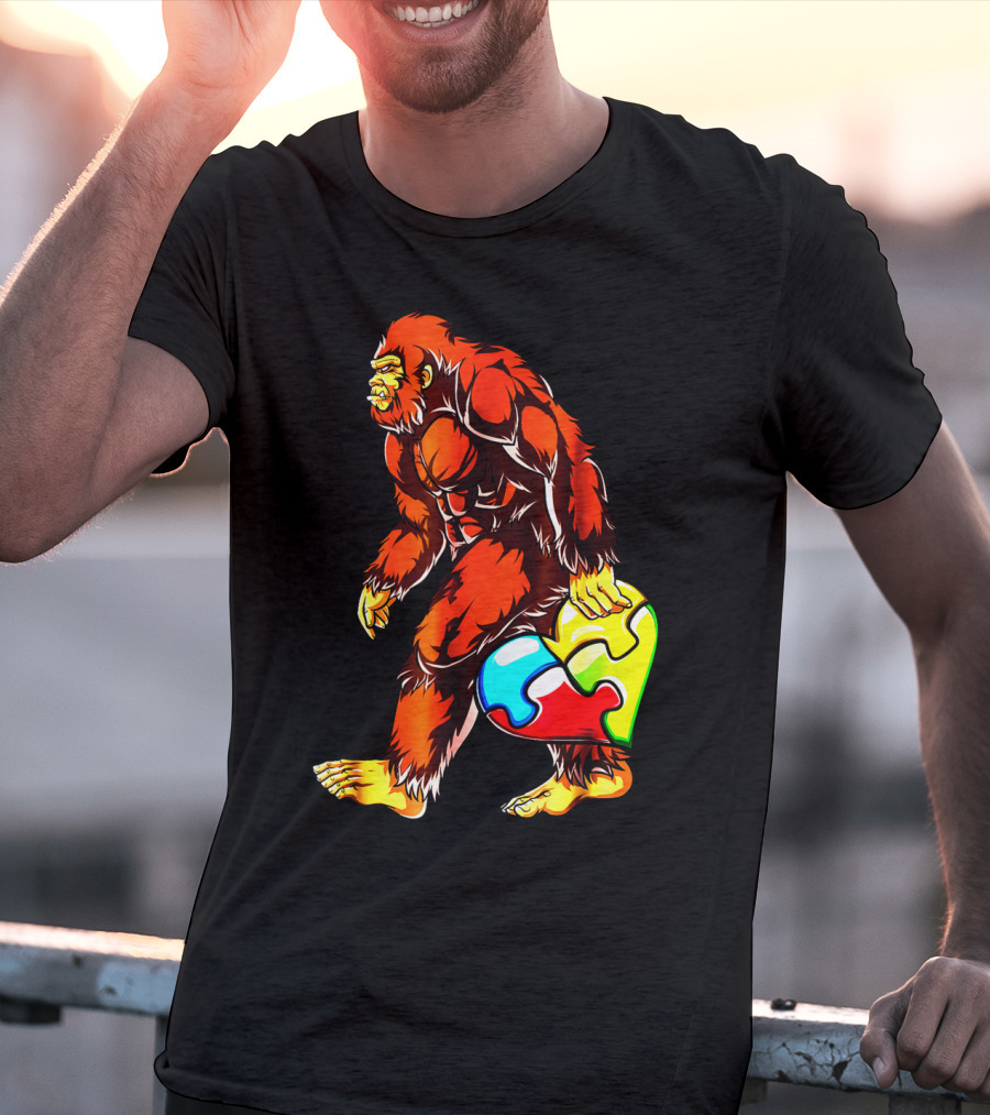Bigfoot Holding Heart-Shaped Puzzle Piece For Autism Awareness T-Shirt
