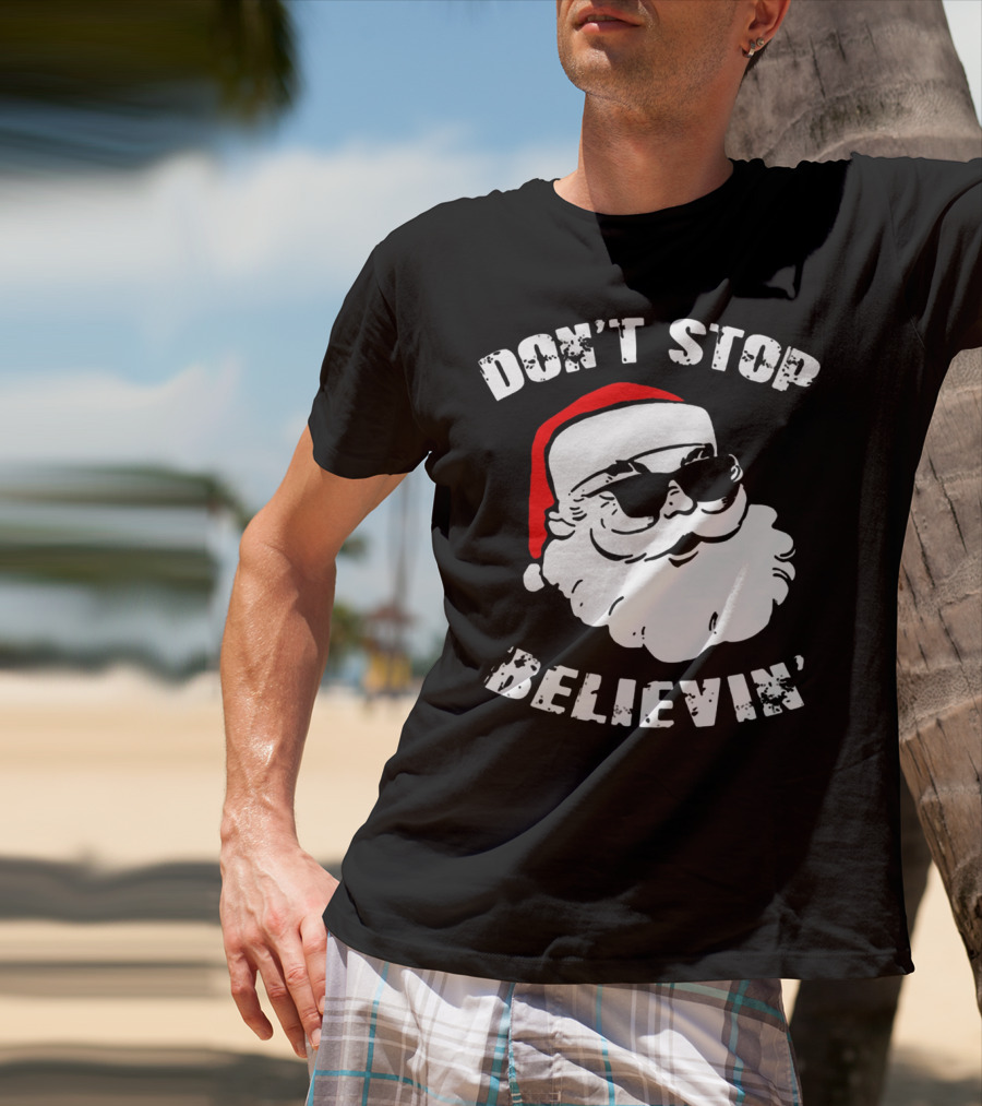 DON'T STOP BELIEVIN' SANTA WITH SUNGLASSES T-Shirt