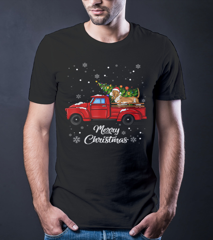 Merry Christmas Basset Hound With Santa Hat On Red Truck With Christmas Tree And Snowflakes T-Shirt