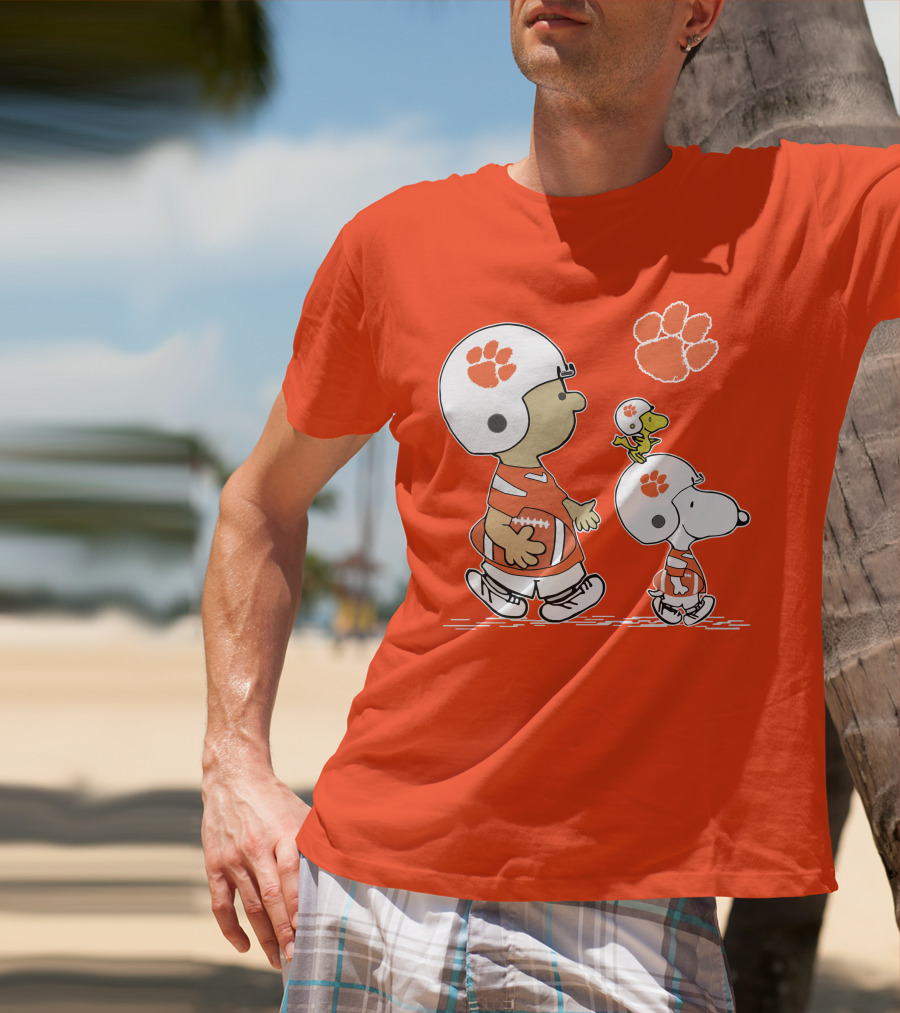 Clemson Tigers Snoopy Football Helmets And Paw Print Charlie Brown Woodstock T-Shirt