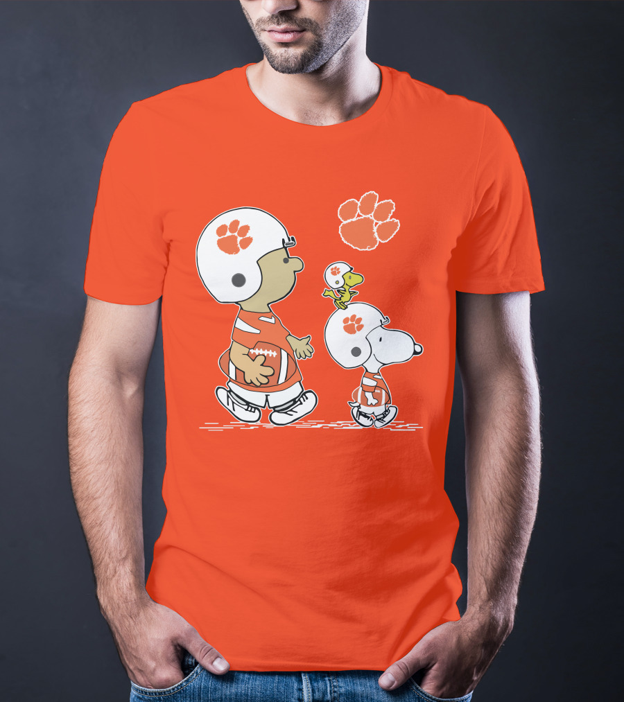 Clemson Tigers Snoopy Football Helmets And Paw Print Charlie Brown Woodstock T-Shirt