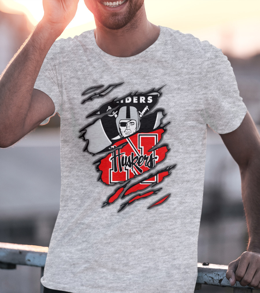 Raiders Huskers Torn Design With Icons And Symbols T-Shirt