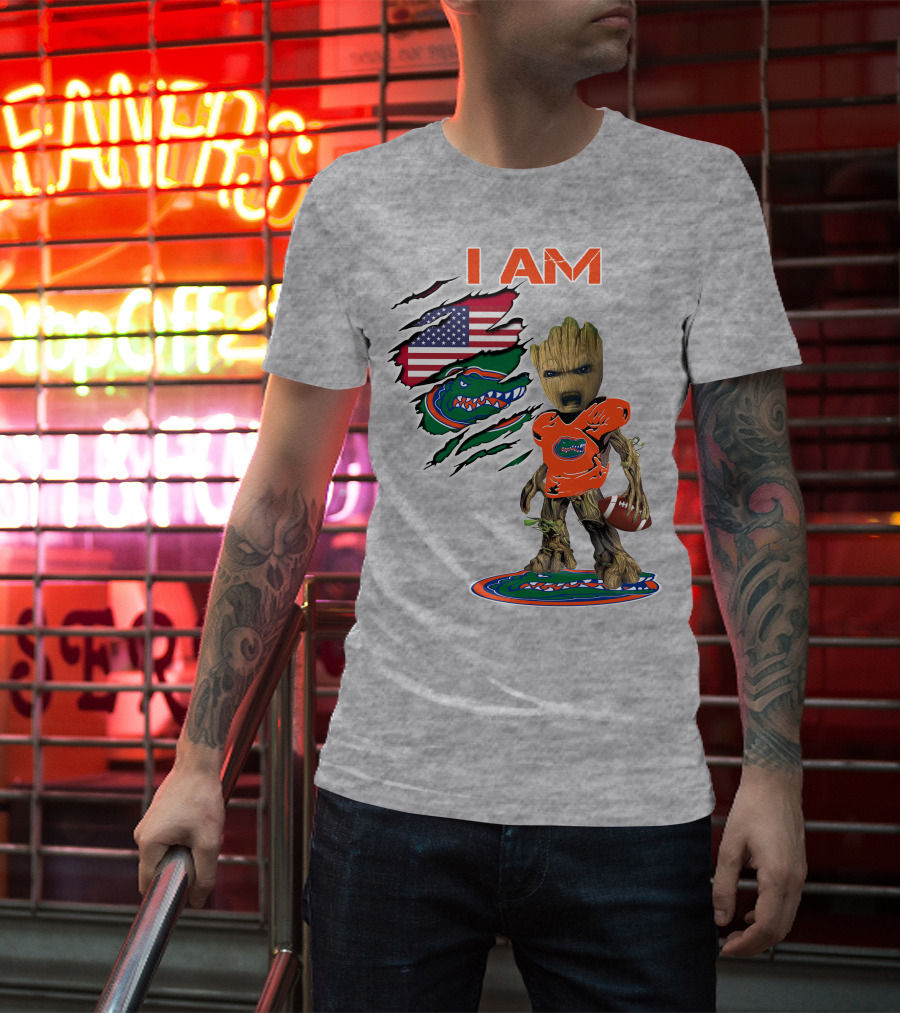 I Am Gators Baby Groot Holding Football With American Flag And Florida Gators T-Shirt