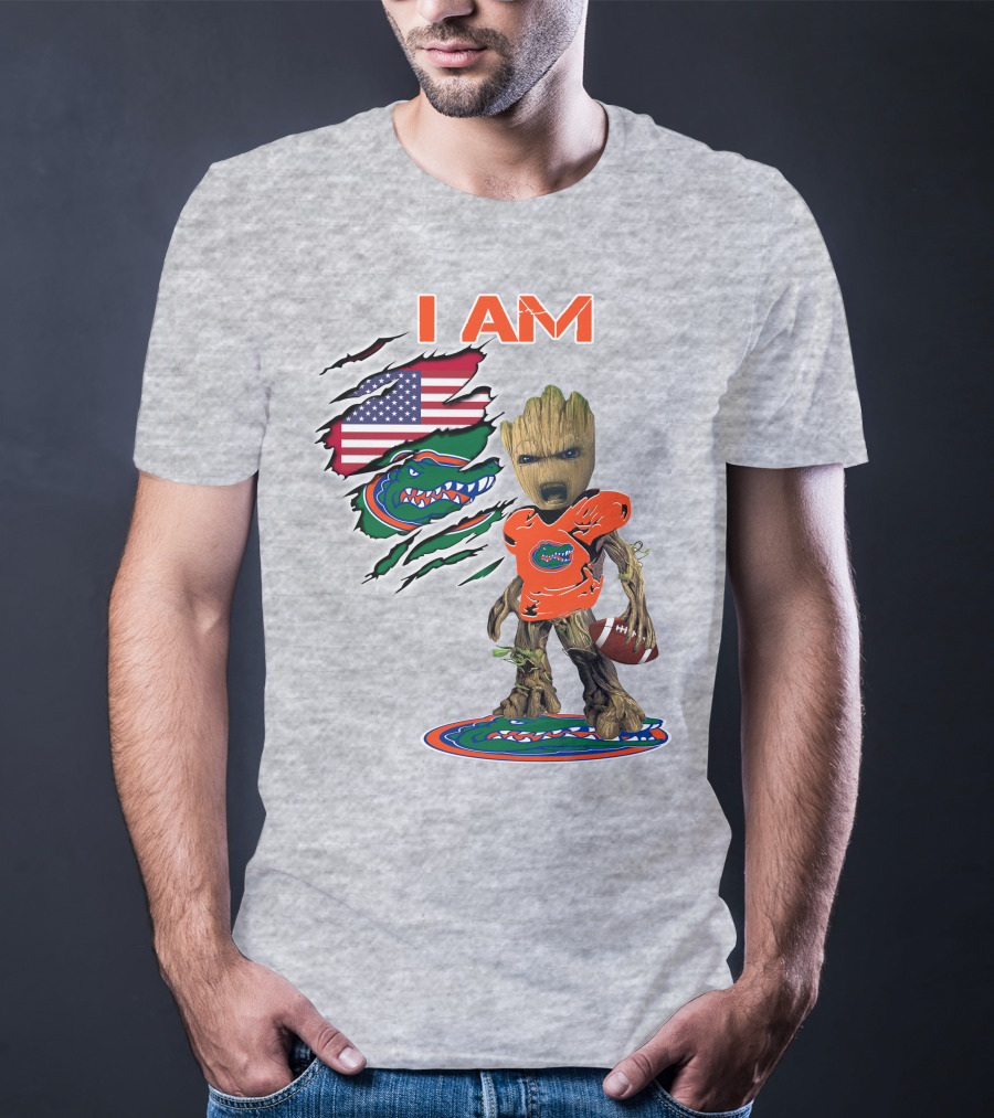 I Am Gators Baby Groot Holding Football With American Flag And Florida Gators T-Shirt