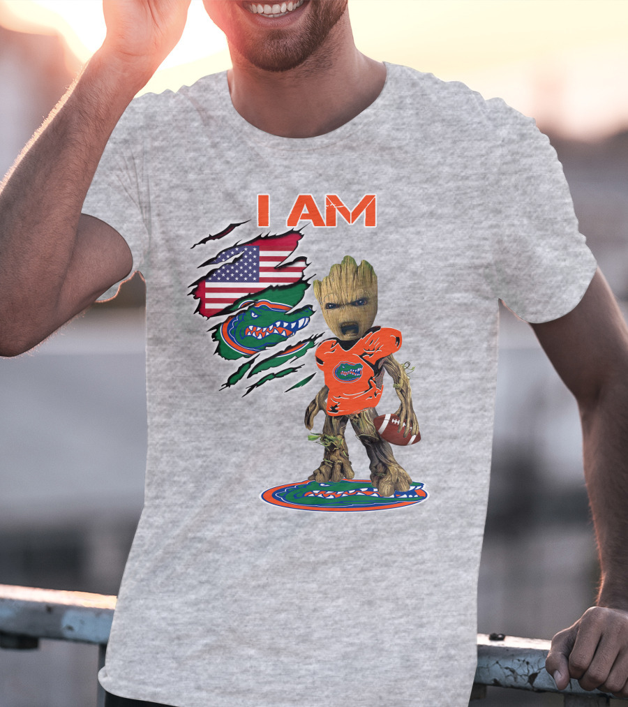 I Am Gators Baby Groot Holding Football With American Flag And Florida Gators T-Shirt