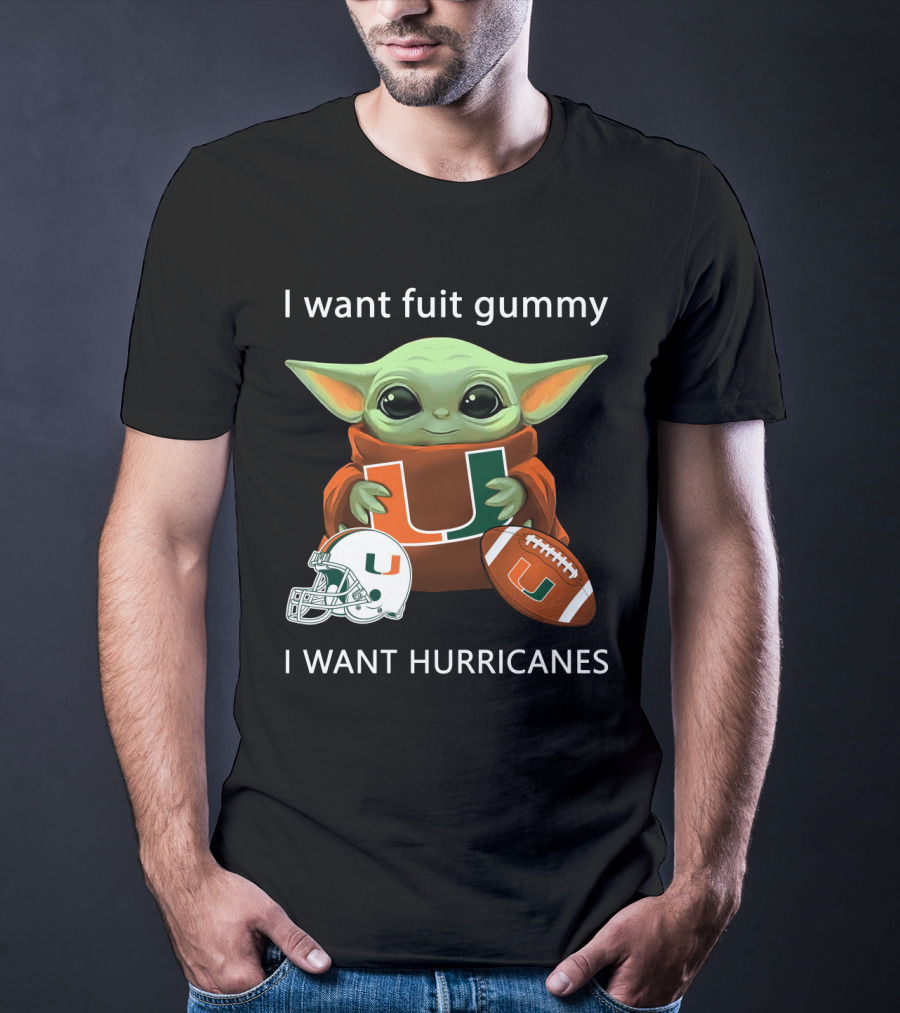 I Want Fuit Gummy I Want Hurricanes Baby Yoda Holding Miami Hurricanes Logo Helmet And Football T-Shirt