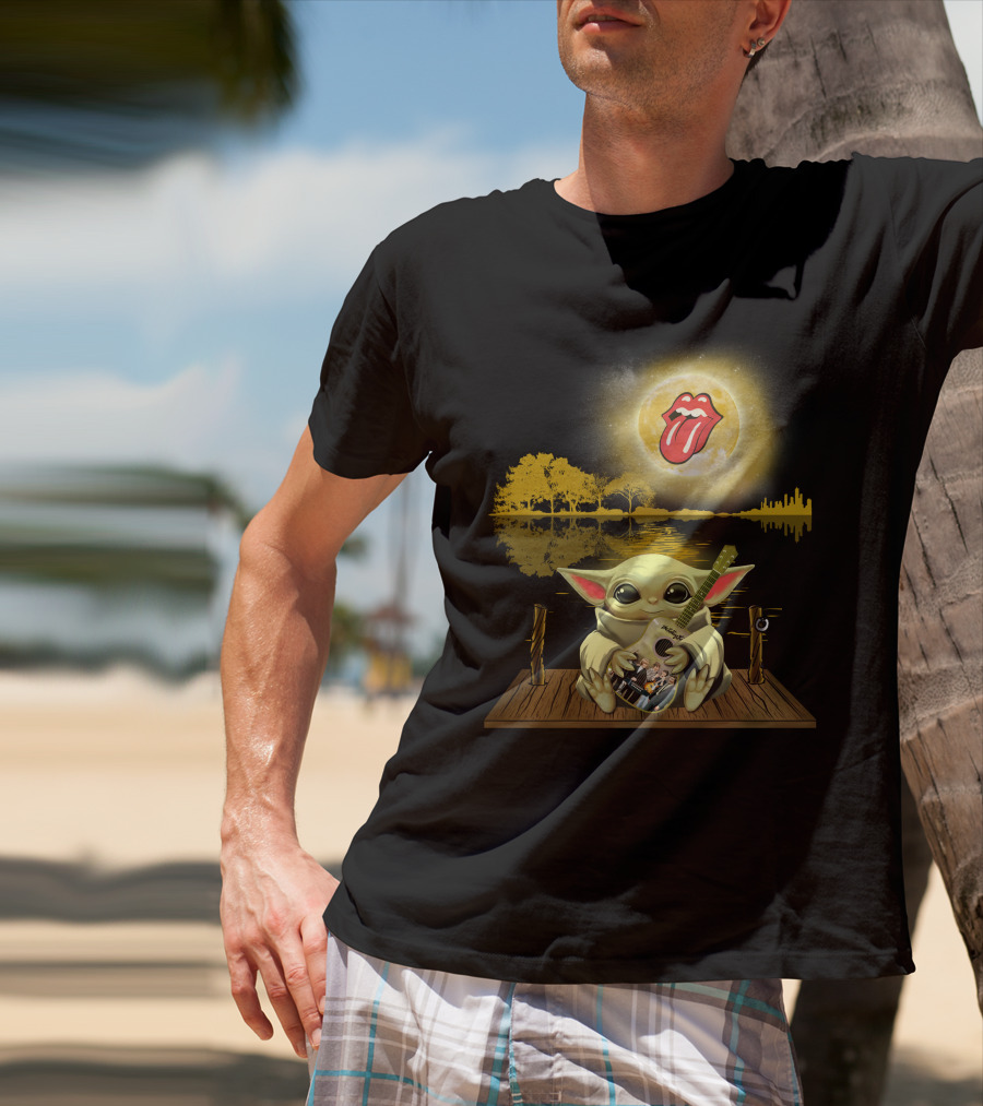 The Rolling Stones Tongue Logo And Baby Yoda With Guitar Under Moonlit Sky Trees And Lake Reflection T-Shirt