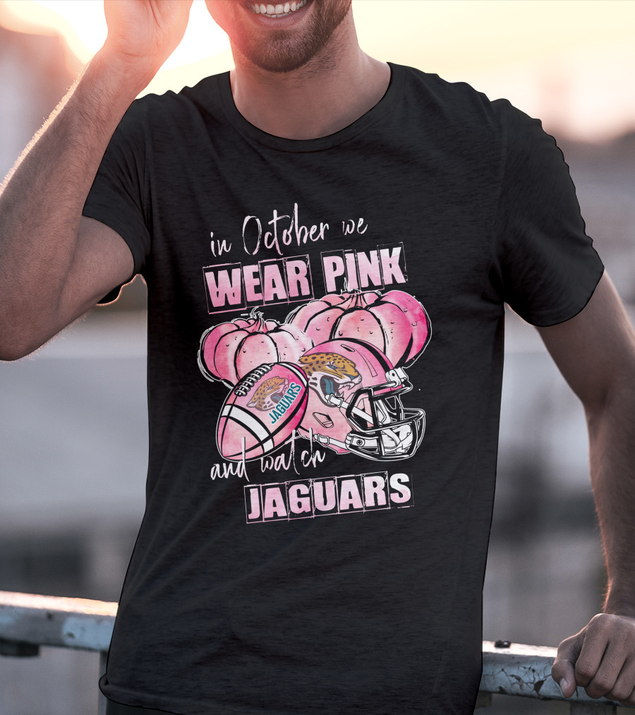 In October We Wear Pink And Watch Jaguars Football Helmet Pumpkins T-Shirt