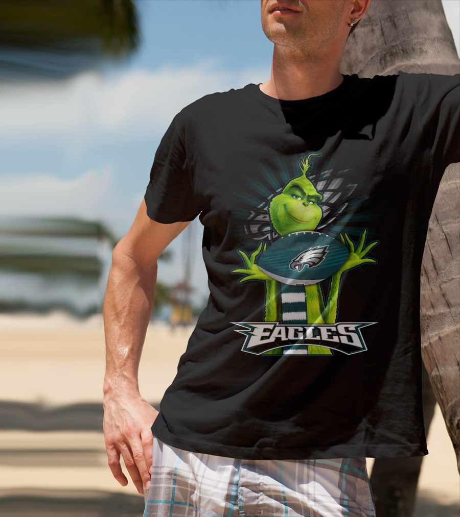 Grinch Holding Philadelphia Eagles Football With Team T-Shirt