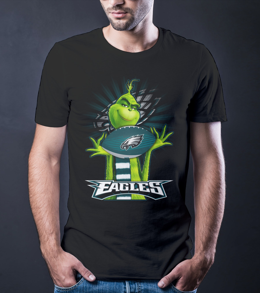 Grinch Holding Philadelphia Eagles Football With Team T-Shirt