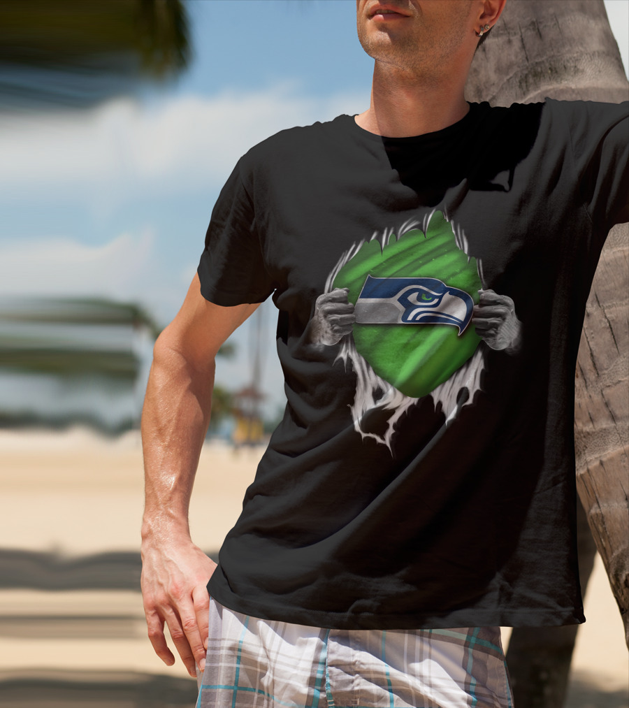 Torn Seattle Seahawks Logo With Green Background And Hands Peeling Fabric T-Shirt