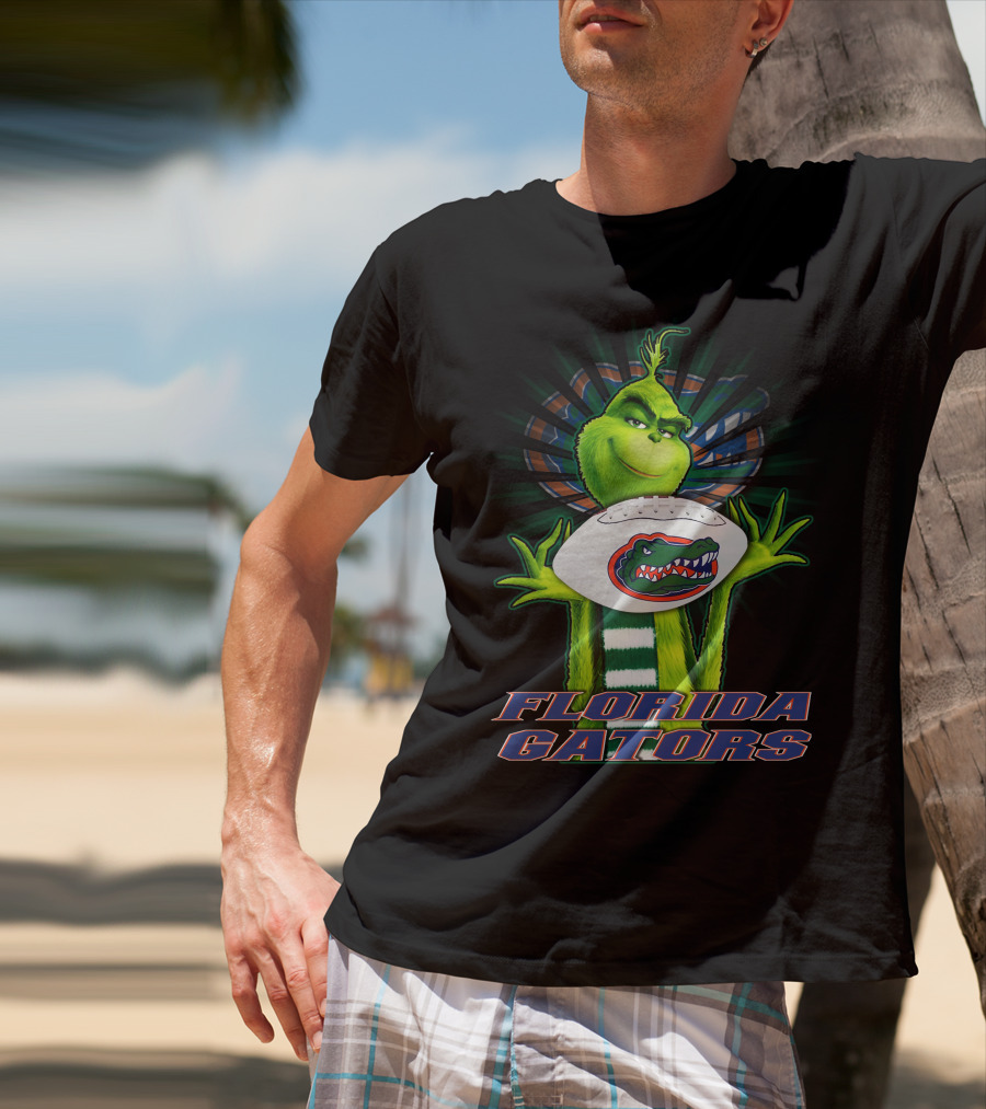 Grinch Holding Florida Gators Football T-Shirt