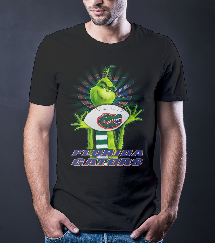 Grinch Holding Florida Gators Football T-Shirt