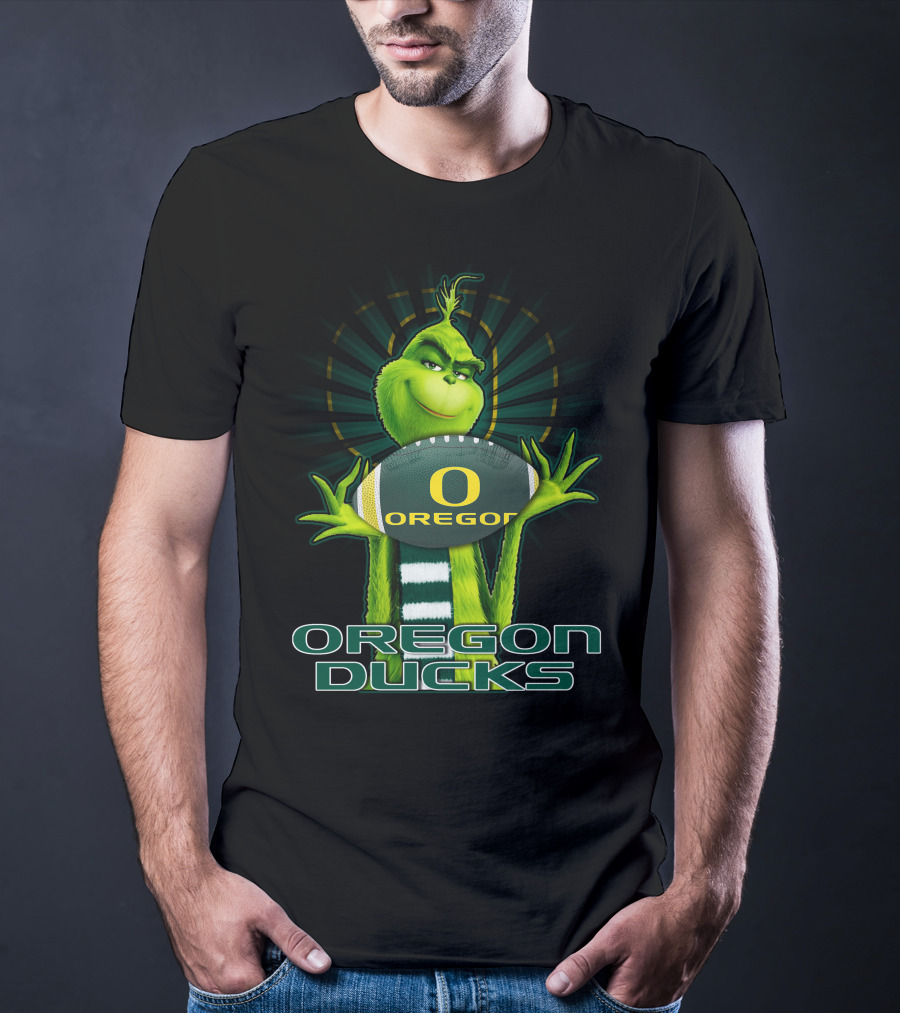 Grinch Holding Oregon Ducks Football T-Shirt