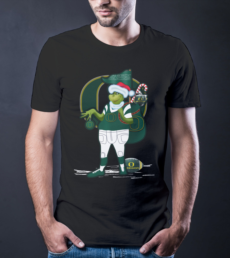Oregon Ducks Grinch Santa With Candy Cane And Football T-Shirt