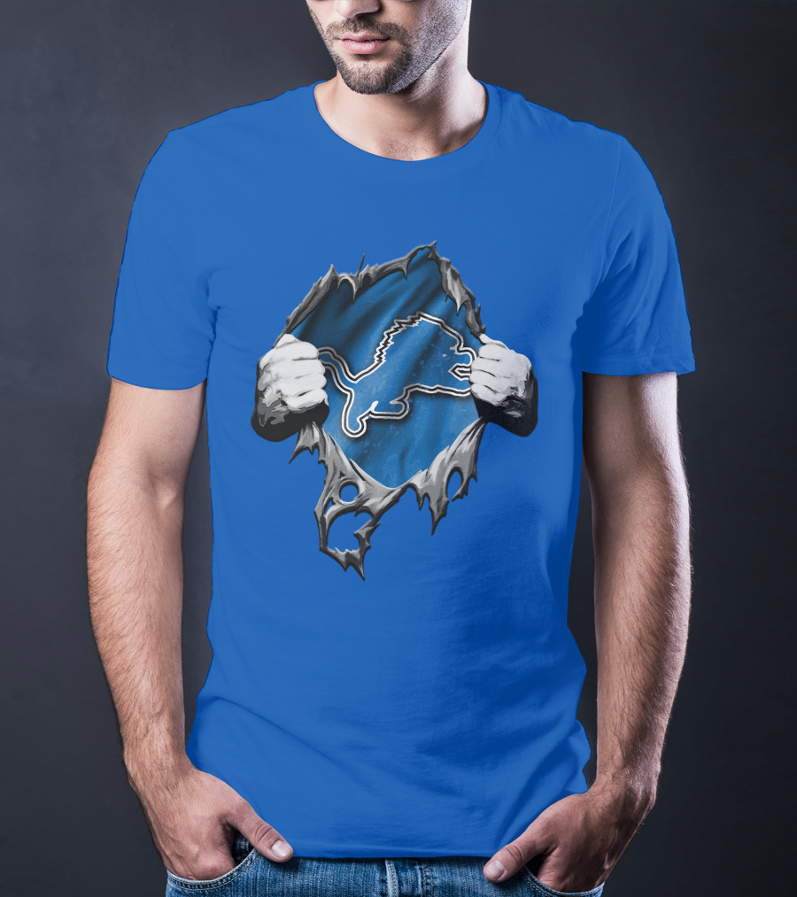 Torn Skin Revealing Detroit Lions Emblem On Blue T-Shirt