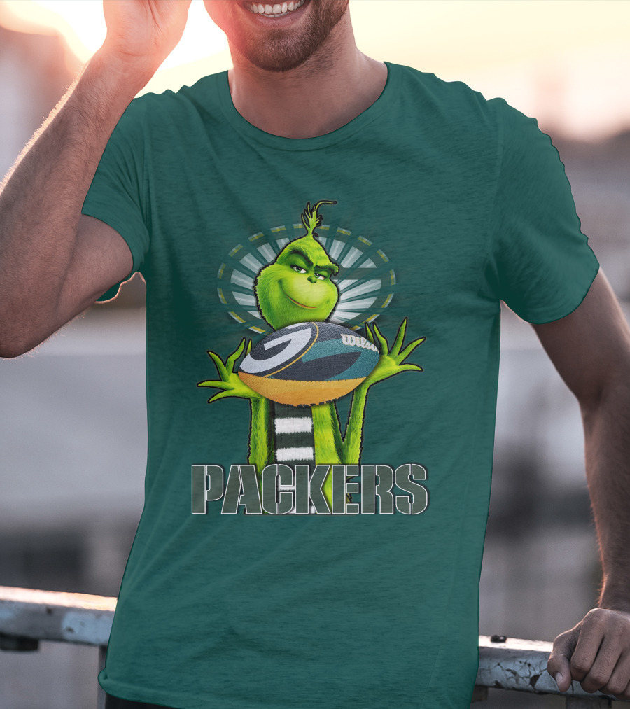 Grinch Holding Green Bay Packers Wilson Football T-Shirt