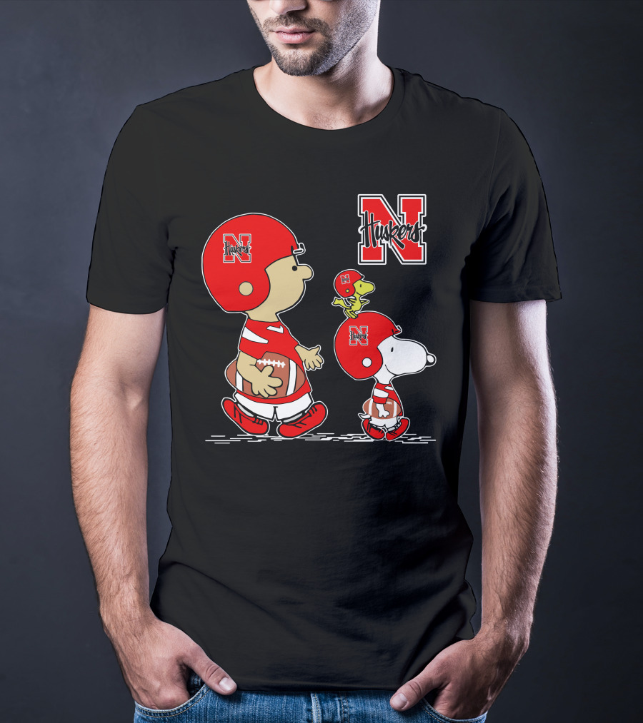 Nebraska Cornhuskers Peanuts Charlie Brown And Snoopy Football Helmets T-Shirt