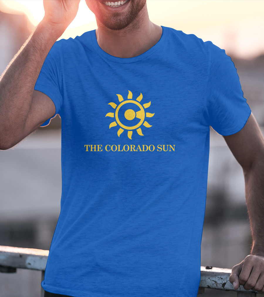 The Colorado Sun Merch Colorado Sun Logo Yellow Sunburst Blue Background T-Shirt