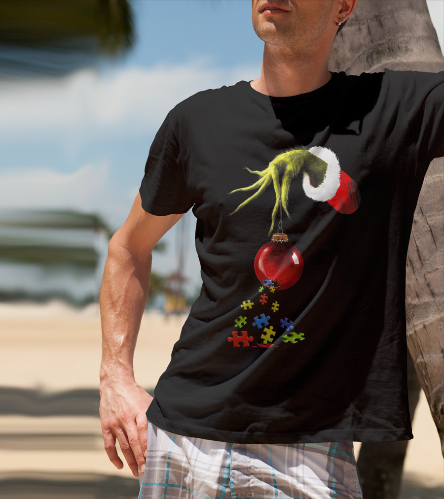 Grinch Hand Holding Red Ornament With Autism Puzzle Pieces T-Shirt