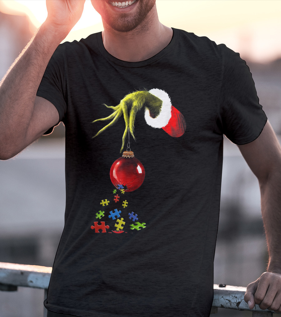 Grinch Hand Holding Red Ornament With Autism Puzzle Pieces T-Shirt