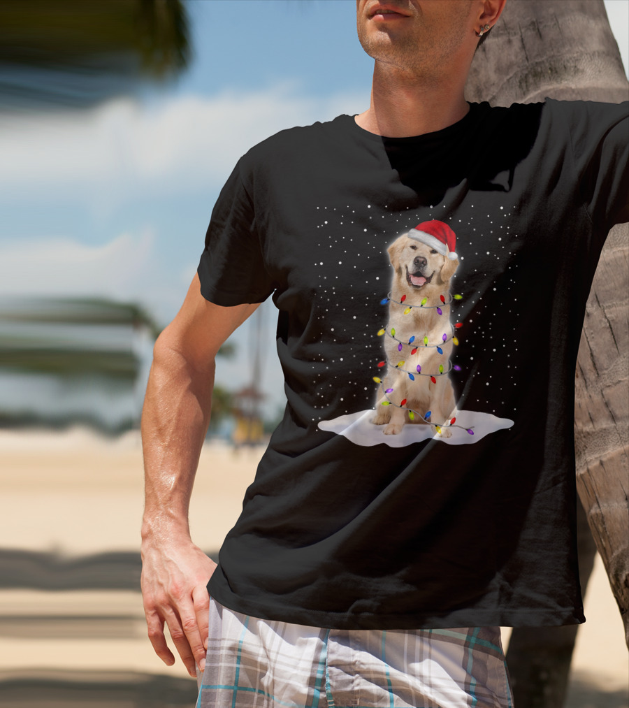Golden Retriever With Santa Hat Wrapped In Colorful Christmas Tree Lights And Snowflakes T-Shirt