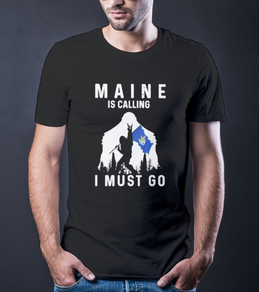 Maine Is Calling I Must Go Bigfoot Holding Maine Flag T-Shirt