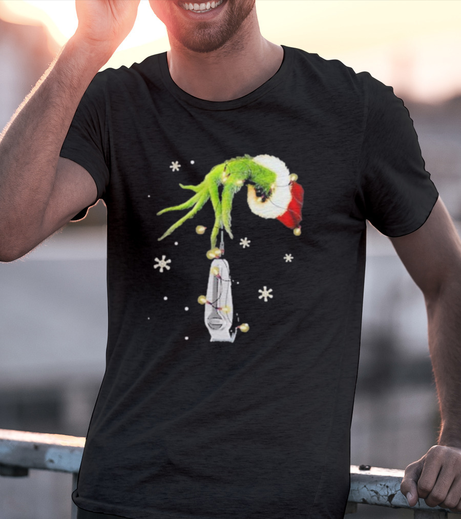 Grinch Christmas Hand Holding Clipper Snowflakes Santa Hat T-Shirt