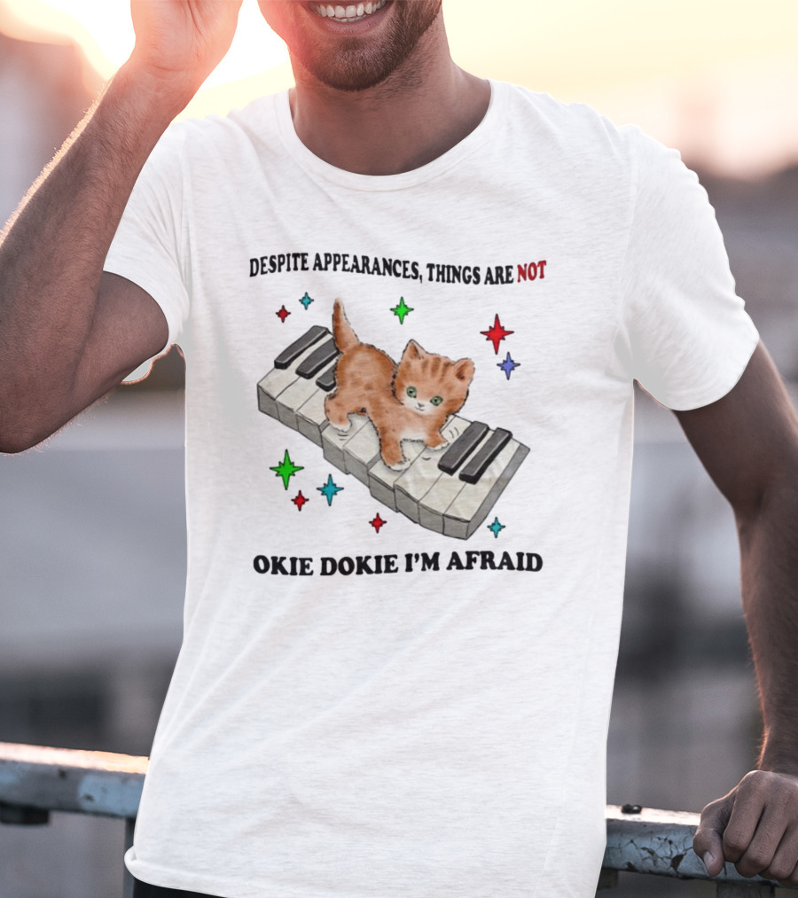 Despite Appearances Things Are Not Okie Dokie I'm Afraid Cat On Piano Keys With Colorful Stars T-Shirt