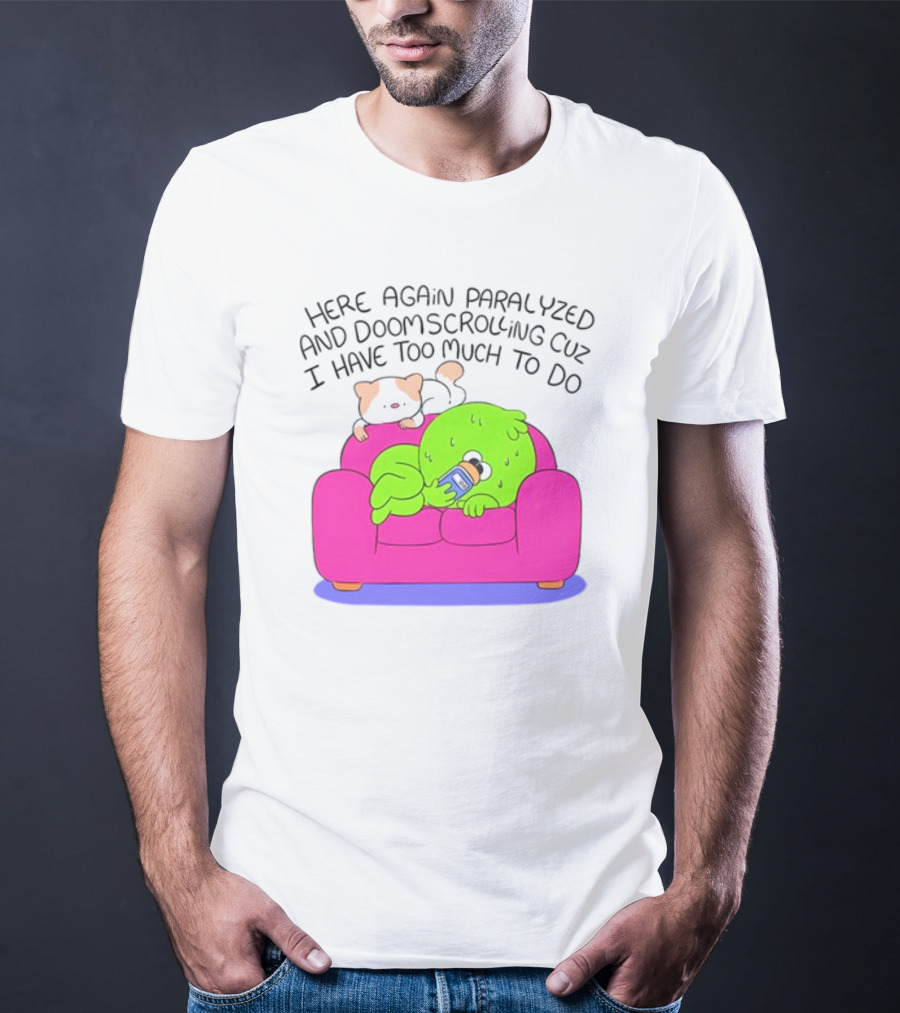 Here Again Paralyzed And Doomscrolling Cuz I Have Too Much To Do Quirky Green Figure Relaxing On Pink Couch With Cute Dog T-Shirt