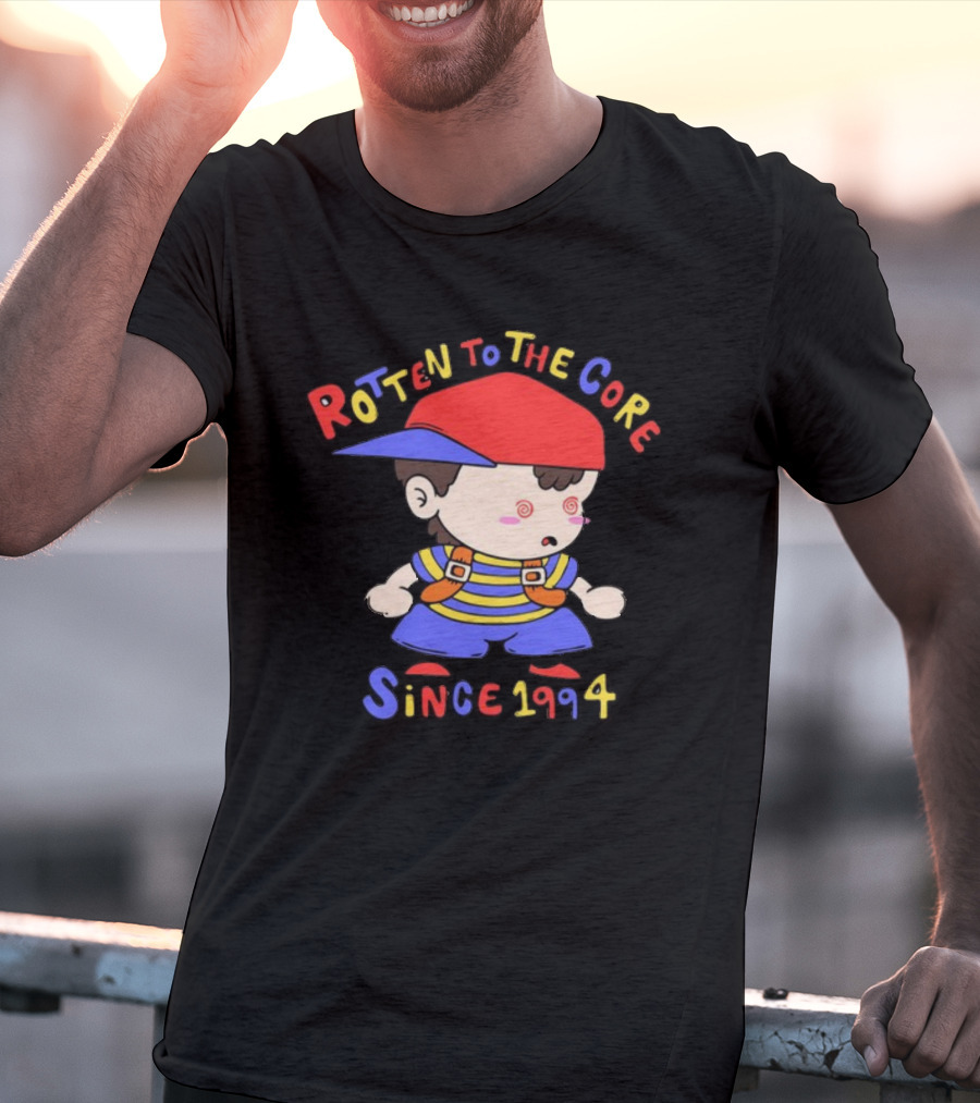 Rotten To The Core Since 1994 Cartoon Character With Red Cap And Striped T-Shirt