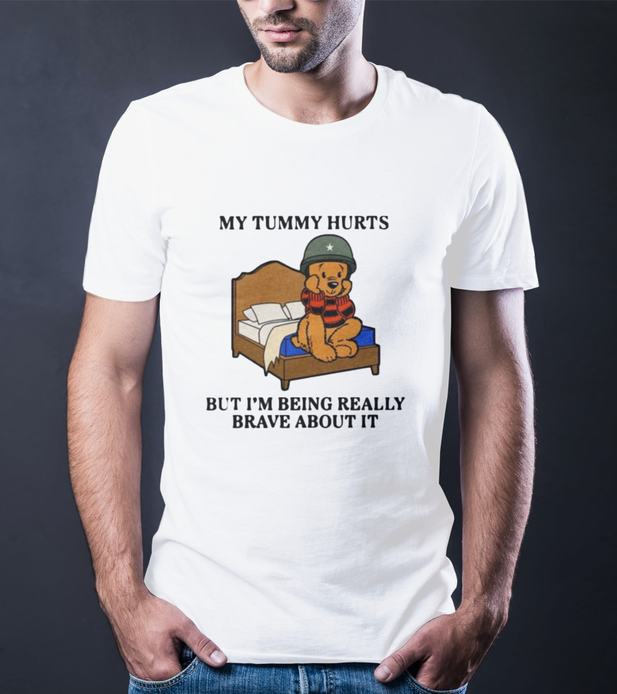 My Tummy Hurts But I'm Being Really Brave About It Bear In Helmet Sitting On Bed T-Shirt