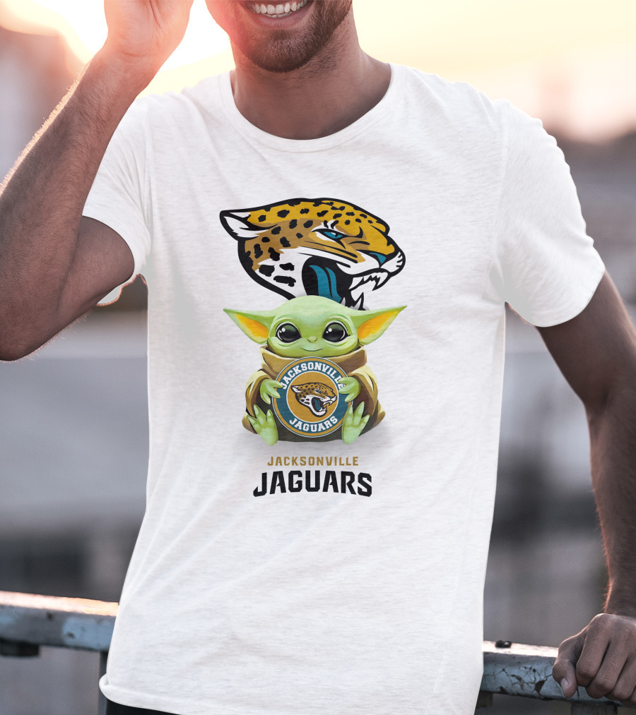 Grogu Holding Jacksonville Jaguars Badge With Mascot In Background T-Shirt