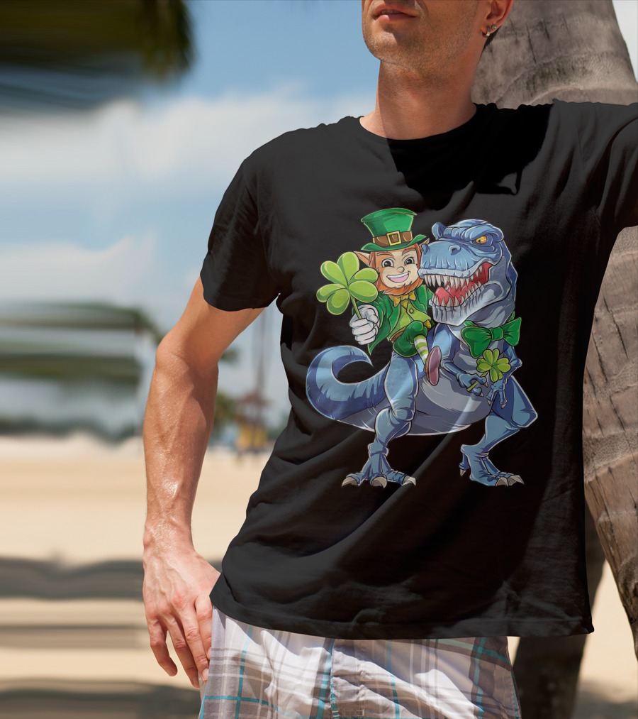 Leprechaun With Shamrock And Bowtie Riding T-Rex Dinosaur T-Shirt