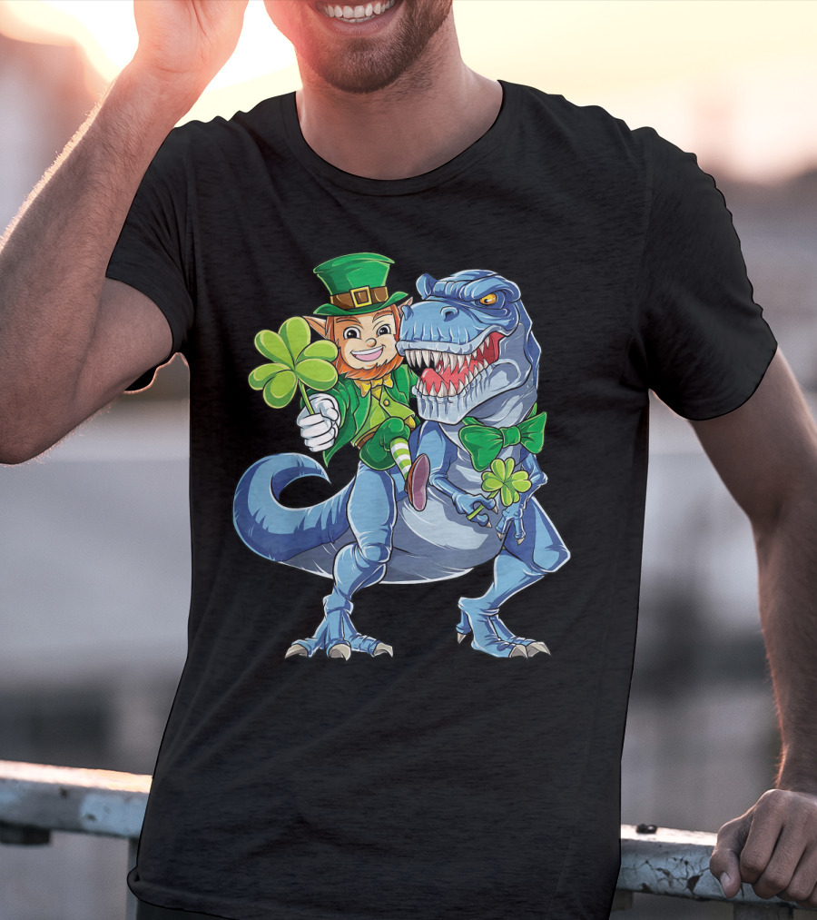 Leprechaun With Shamrock And Bowtie Riding T-Rex Dinosaur T-Shirt