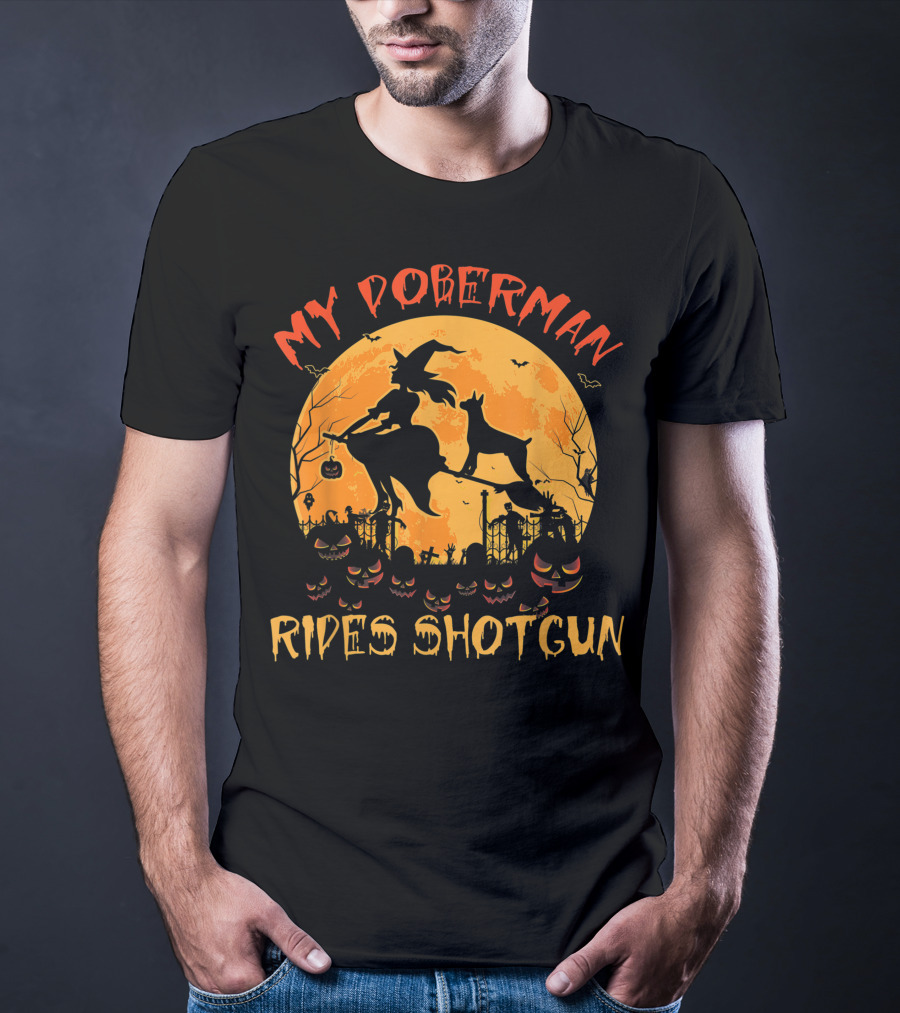My Doberman Rides Shotgun Halloween Witch And Pumpkins Moon Scene T-Shirt