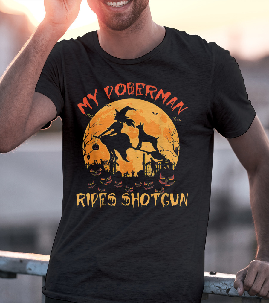 My Doberman Rides Shotgun Halloween Witch And Pumpkins Moon Scene T-Shirt