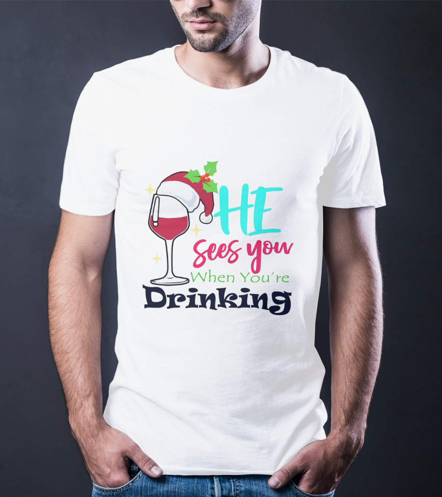 Santa Hat On Wine Glass With 'He Sees You When You're Drinking' Christmas Festive T-Shirt