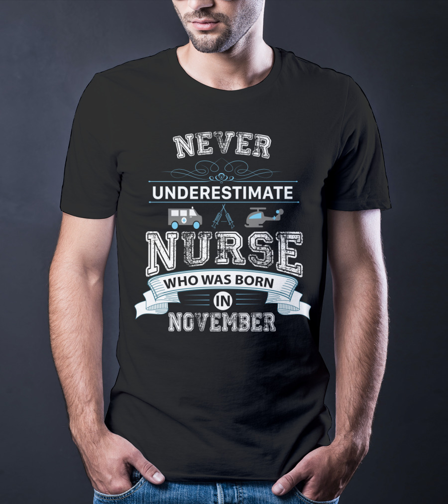 Never Underestimate A Nurse Born In November With Ambulance And Helicopter Elements T-Shirt