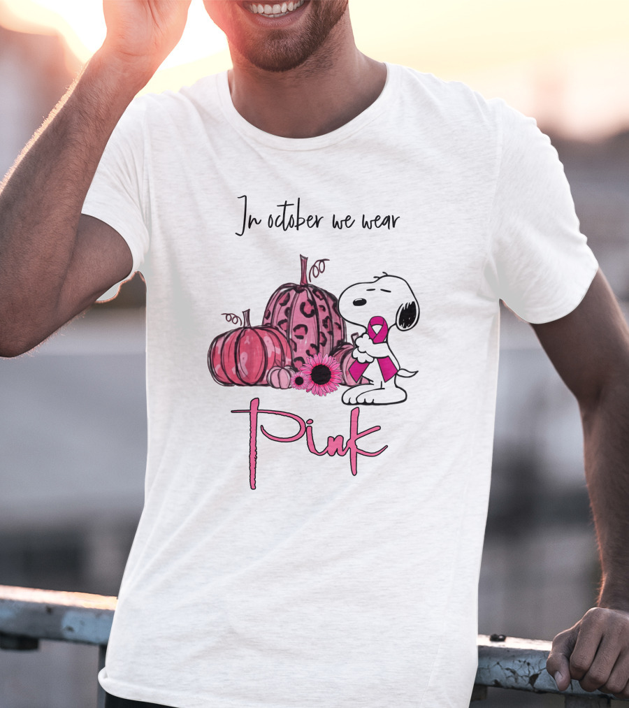 In October We Wear Pink With Peanuts Character Holding Ribbon And Pumpkins T-Shirt