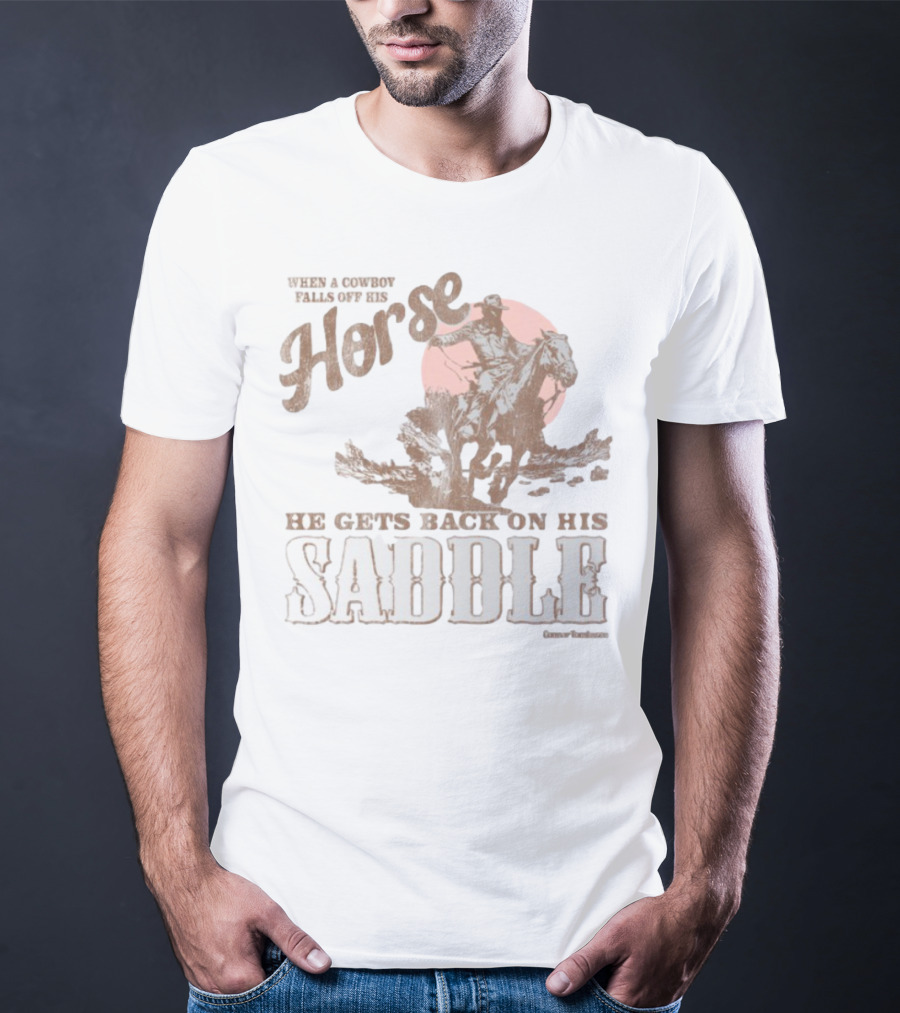 When A Cowboy Falls Off His Horse He Gets Back On His Saddle T-Shirt