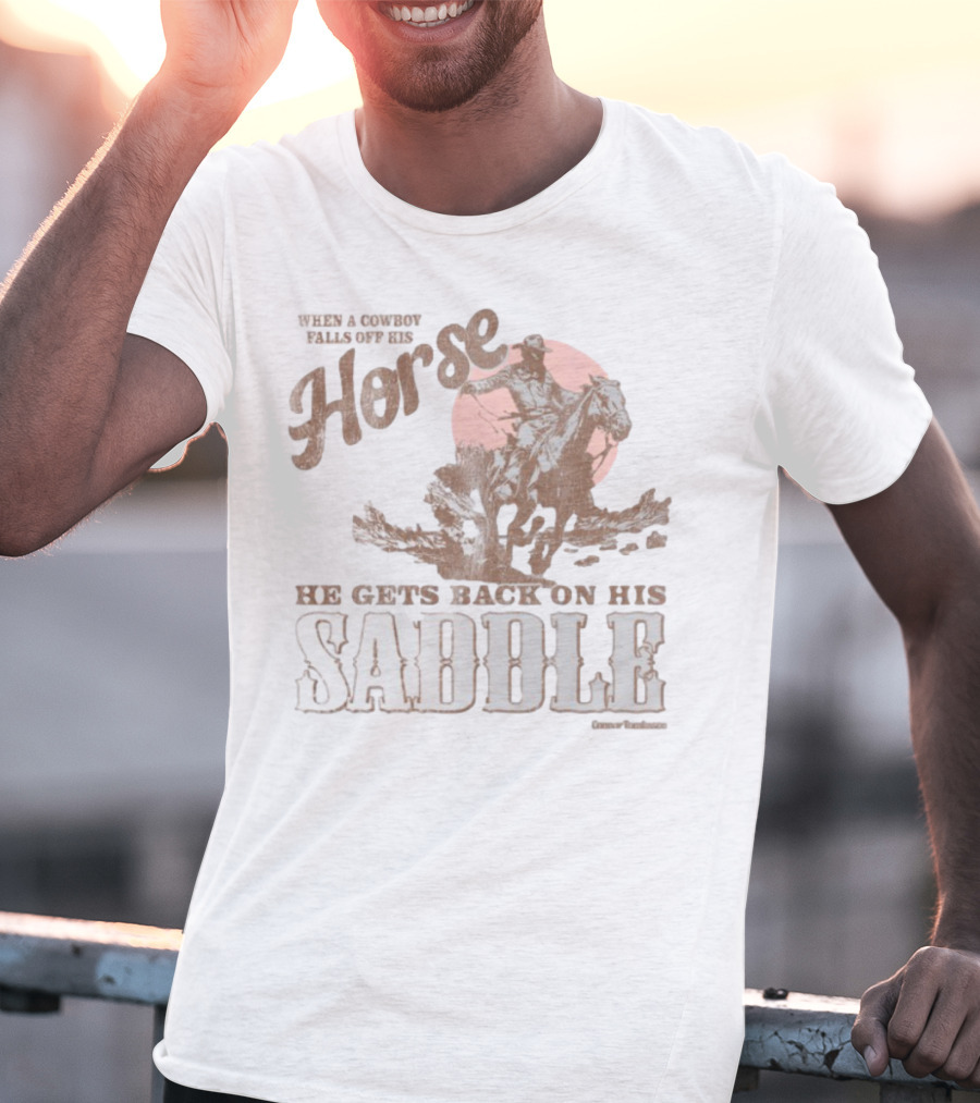 When A Cowboy Falls Off His Horse He Gets Back On His Saddle T-Shirt