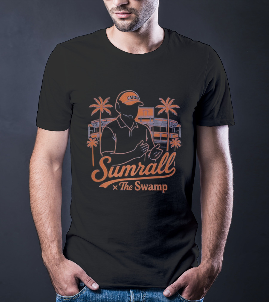 Sumrall The Swamp Coach Illustration With Palm Trees And Building Background T-Shirt