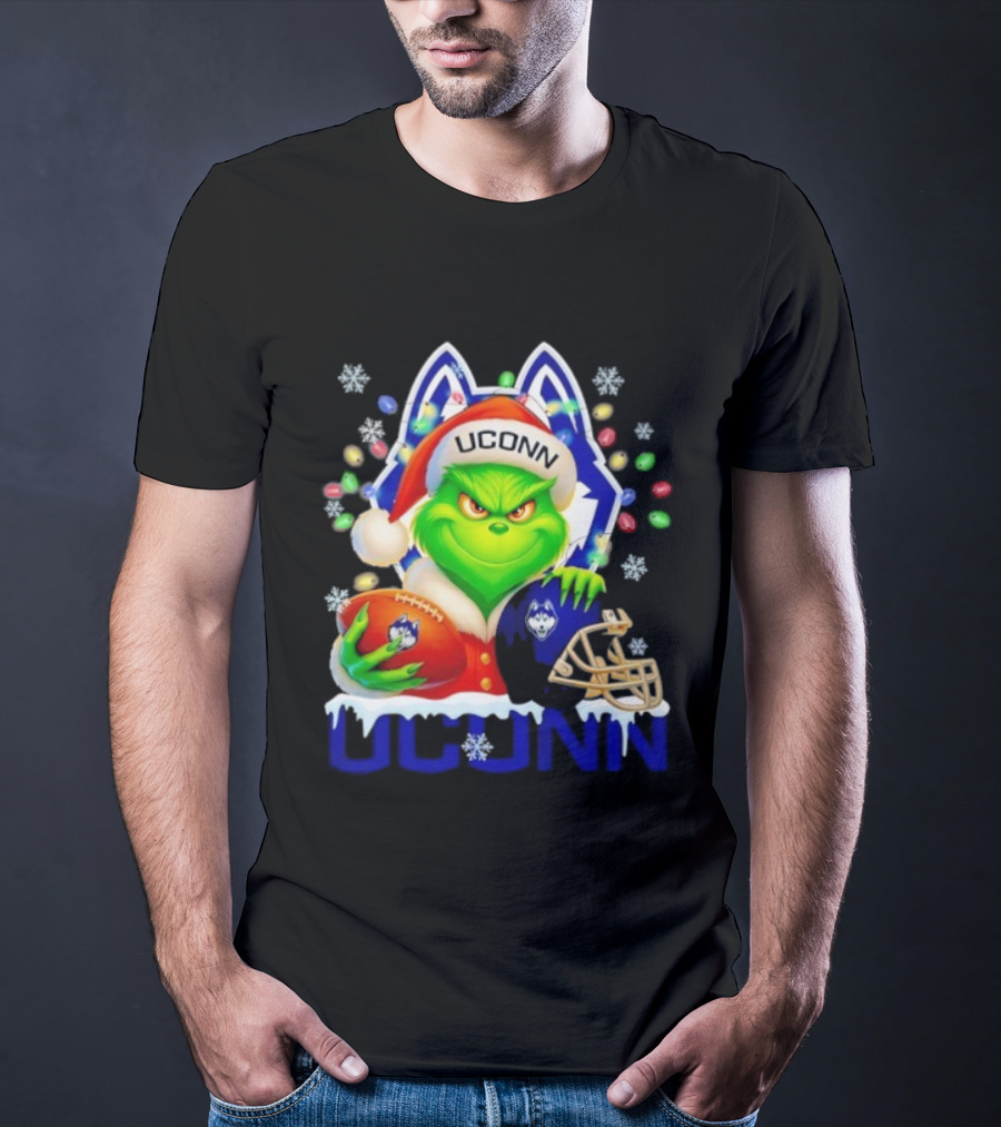 Grinch Wearing Santa Hat With UConn Huskies Football And Helmet Merry Christmas T-Shirt