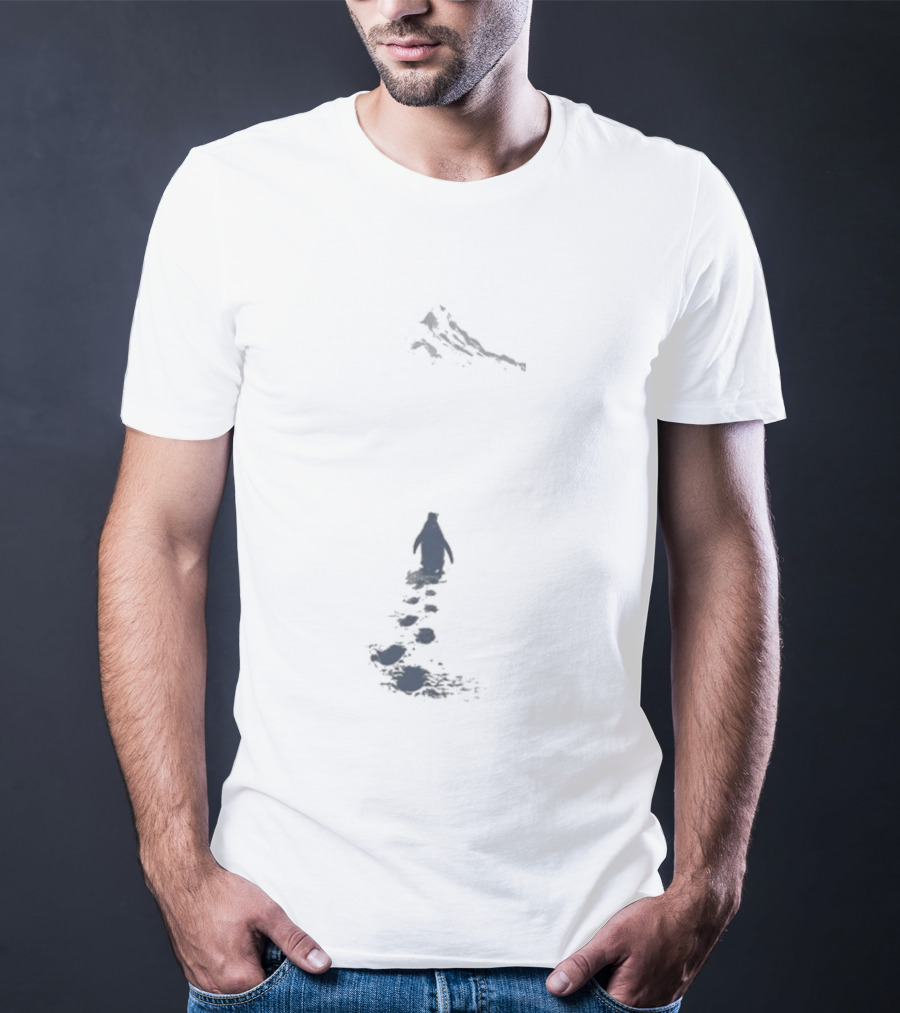 Nihilist Penguin Following Footprints Across White Snow T-Shirt